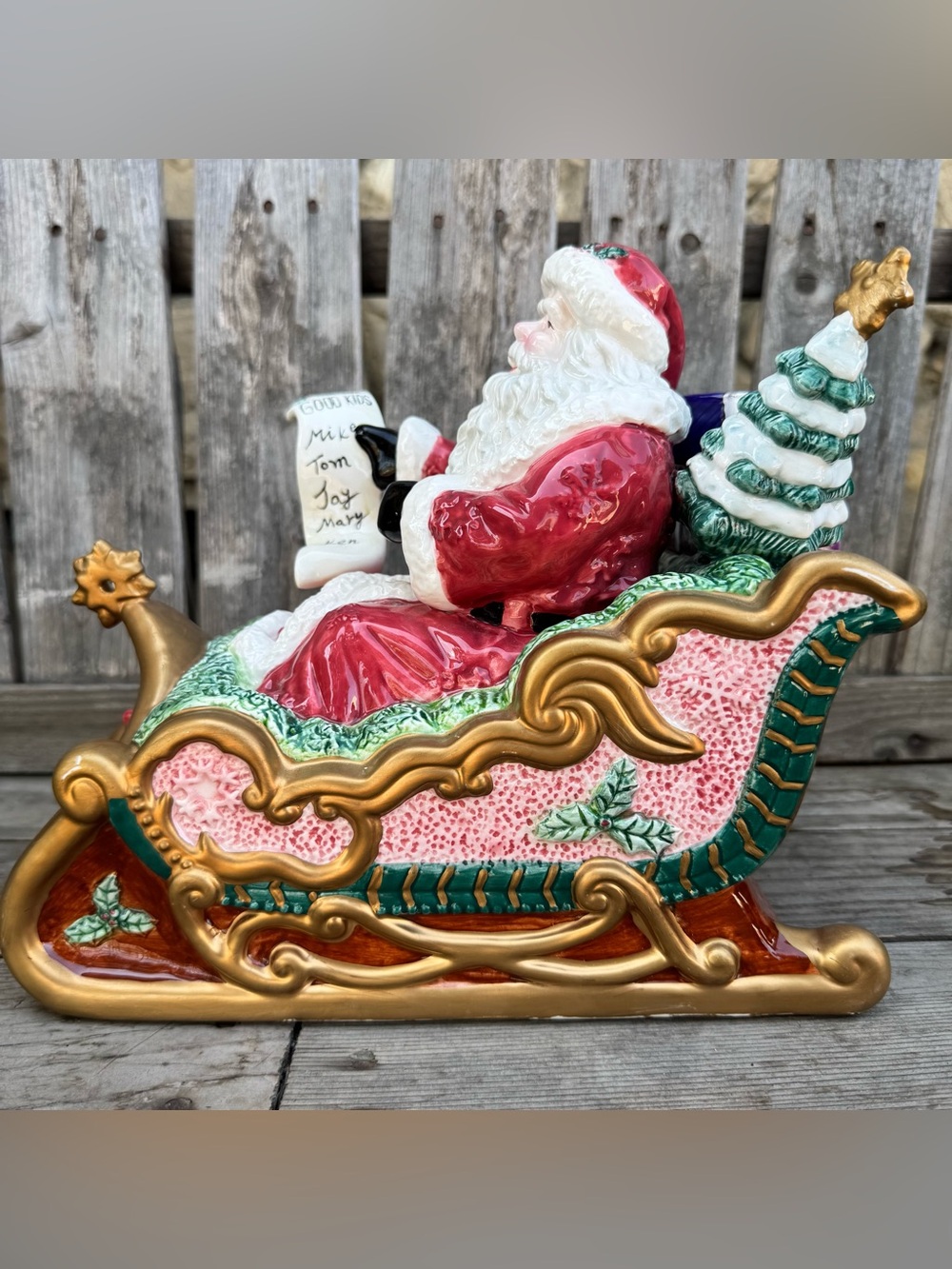 The San Francisco Music Box & Gift Co Musical Santa Sleigh Ceramic Figurine